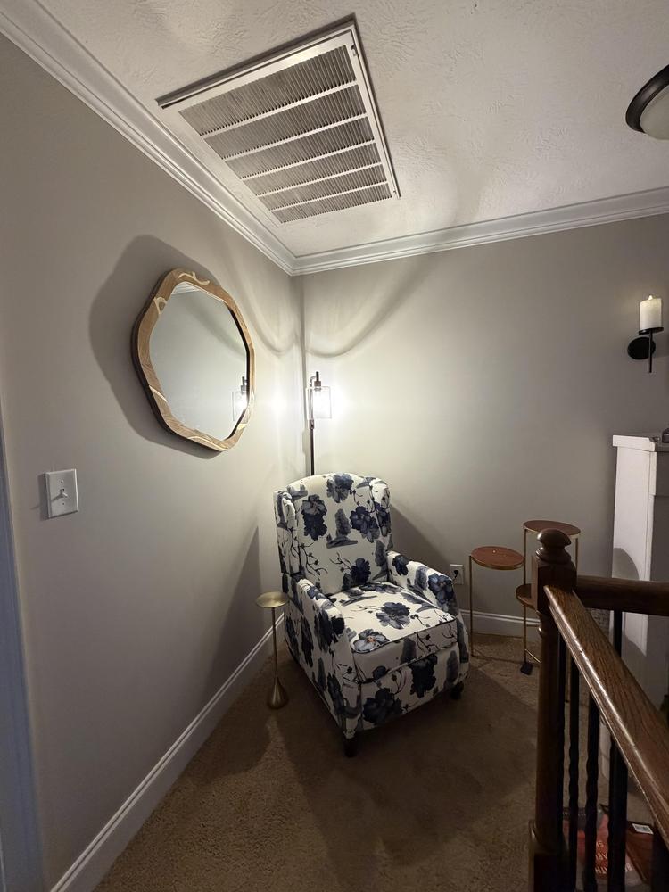 At Home × SCADpro wall mirror installed in a residential corner.